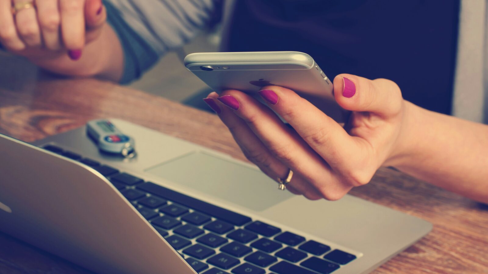 User with laptop and phone